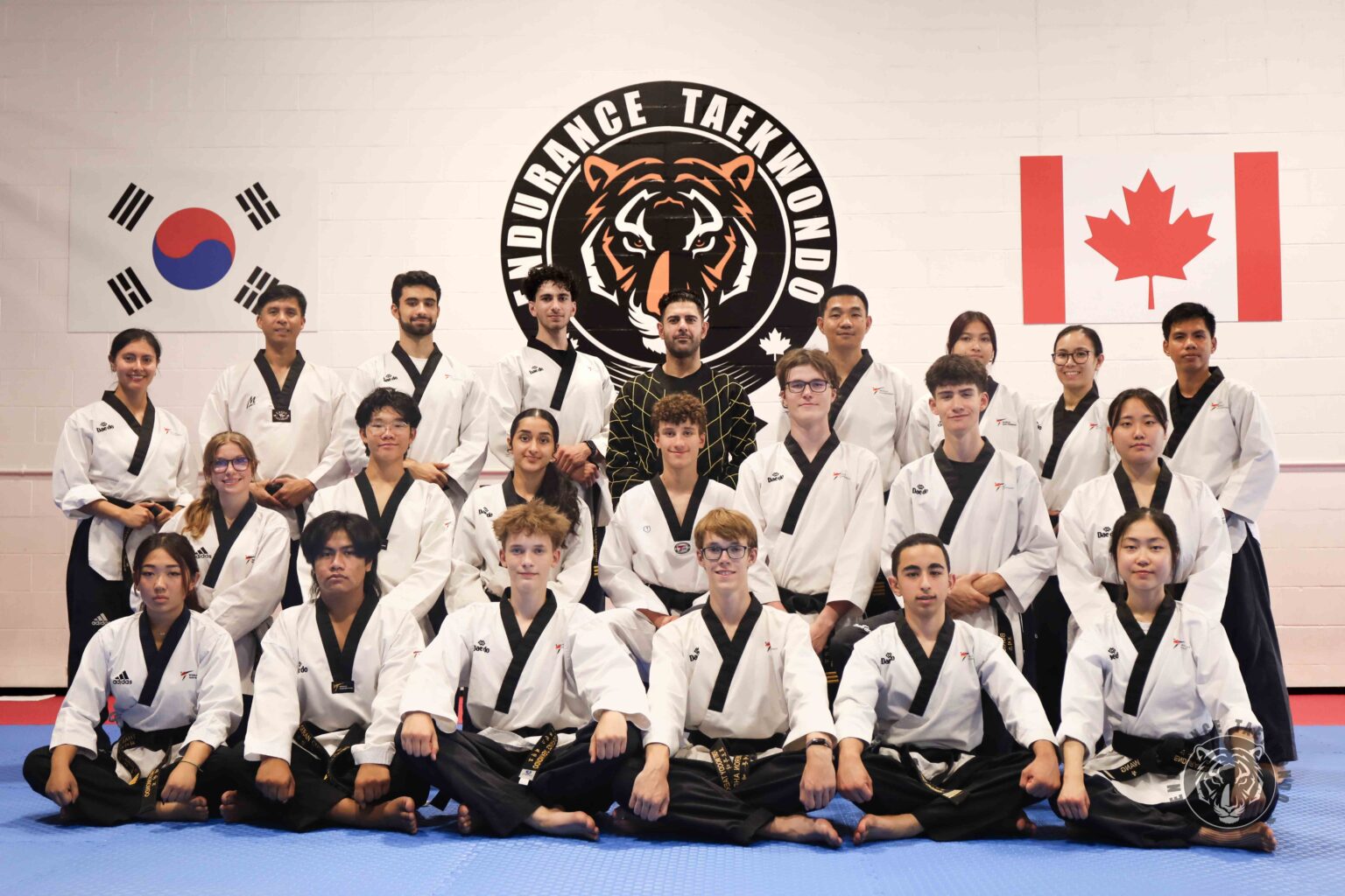 The Endurance Taekwondo instructor team together in the dojang