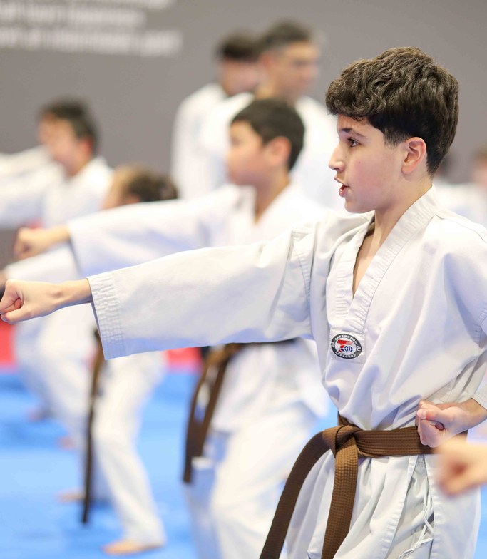 Students punching in a line at Endurance Taekwondo Port Moody After-School Academy